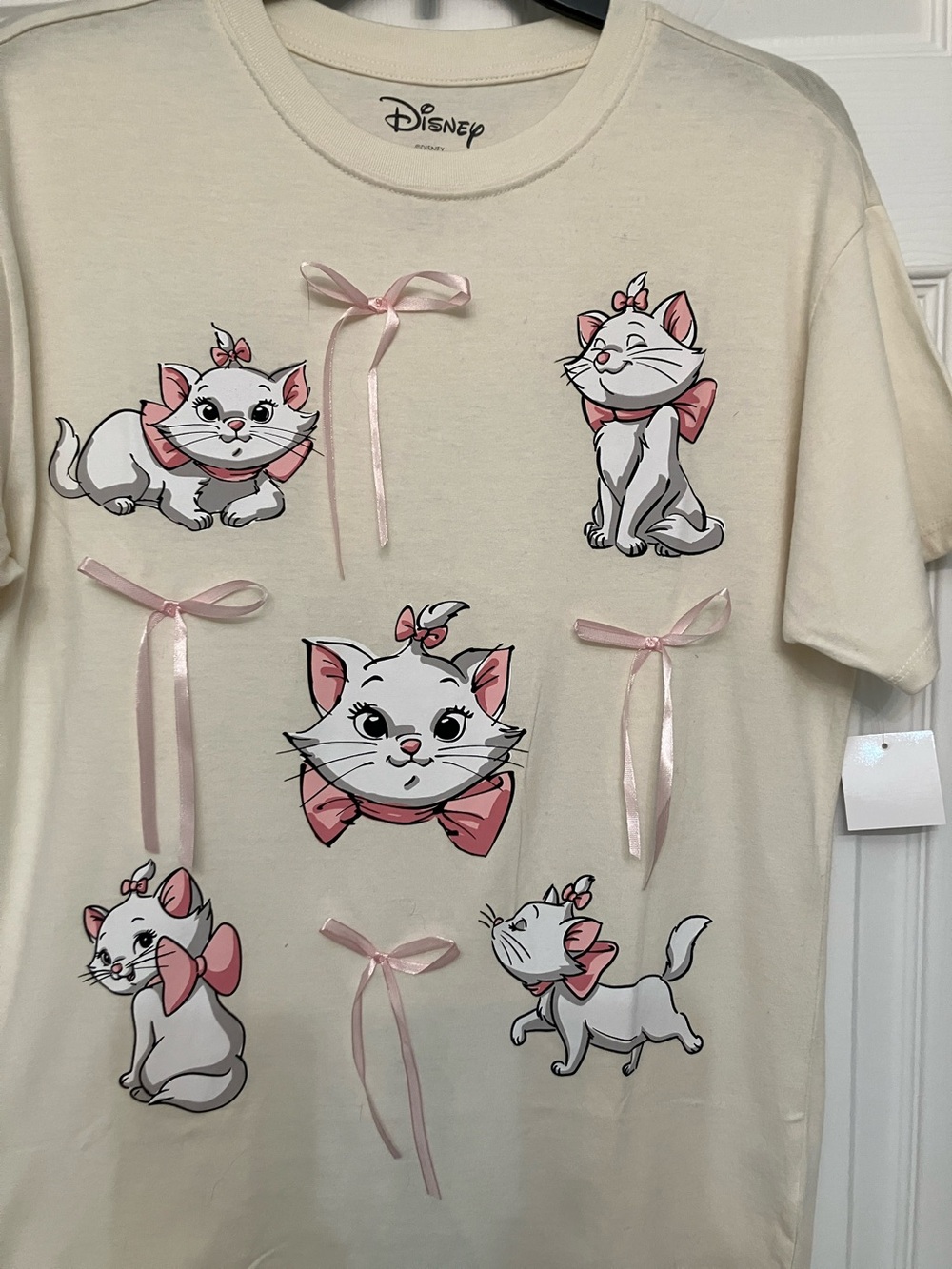 Disney Cream Marie Graphic Tee with Pink Ribbon Details